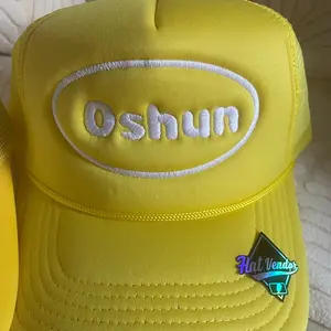 Oshun Brand Trucker Hat - Yellow and White Design with Gold Embroidery