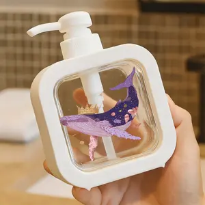 Dreamy Whale Pump Dispenser with Cosmic Patterns - Refillable Soap/Lotion Container Perfect for Bathroom & Kitchen - Pastel Pink Background Decorated with Stars and Royal Crown Elements