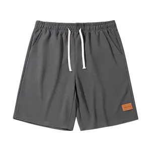 Men’s retro corduroy waffle-pattern casual shorts, loose fit with a slant pocket design, breathable street-style straight cut, suitable for relaxed city walks and outdoor activities — drawstring athletic shorts