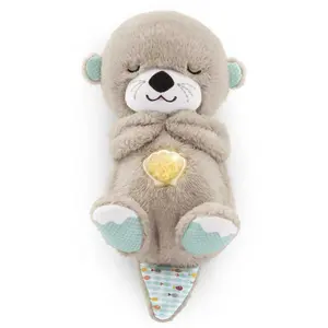 Baby toy Soothe 'n Snuggle - A portable plush sound machine for babies featuring music, lights and breathing movements.