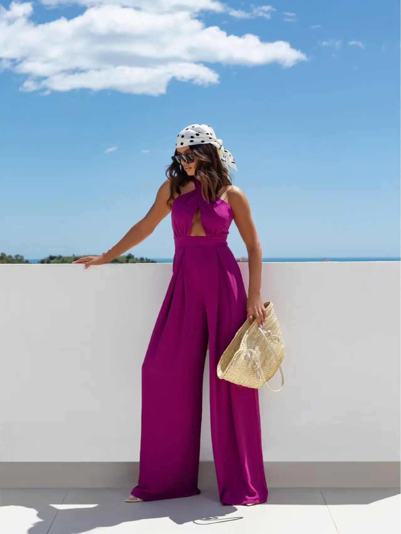 Vibrant Purple Jumpsuit with Wide Legs and Halter Neckline for Summer Style