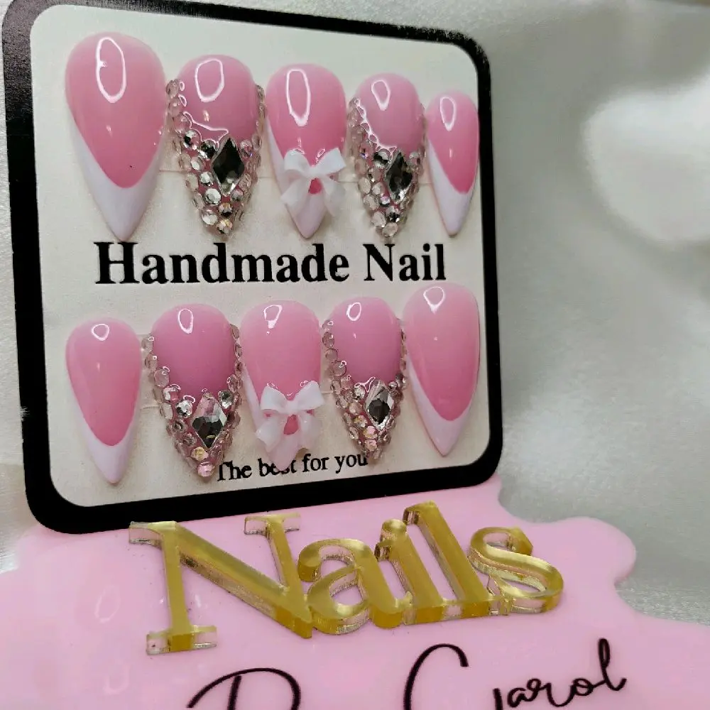 Handmade Nail Stiletto Nails with Pink Bow and Rhinestone Accents for Elegant Look