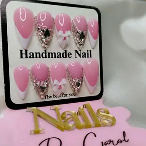 Handmade Nail Stiletto Nails with Pink Bow and Rhinestone Accents for Elegant Look