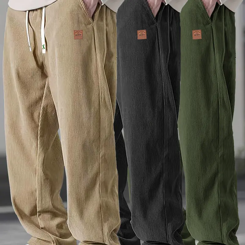 Men’s summer lightweight black corduroy casual pants, brown leather label, drawstring elastic waistband, loose straight fit with a drapey feel, versatile men’s trousers,clothes for back to school,first day of school outfits