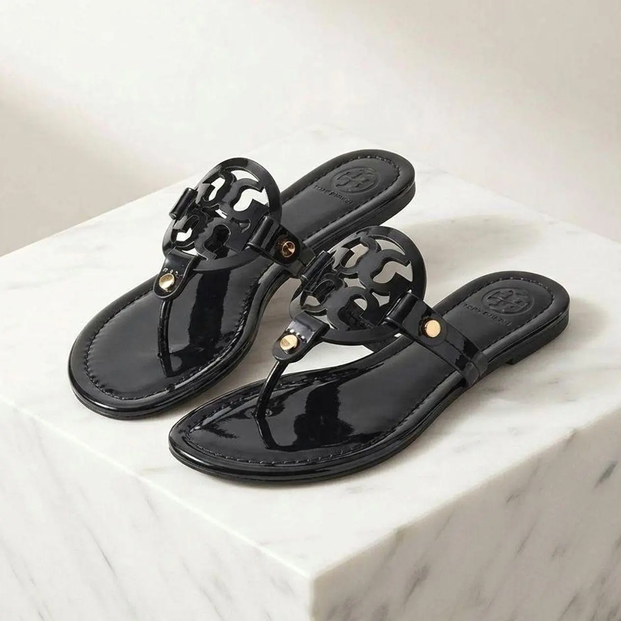 Women’s Glossy Flat Thong Footwear - Cutout Medallion T-Strap Slip-On Open Toe Casual Sandals for Summer Vacation