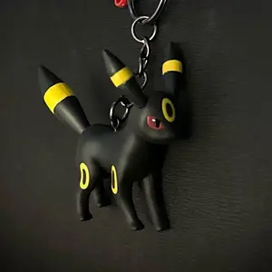 Umbreon Keychain with Clip - Black and Yellow Design Featuring Umbreon Character
