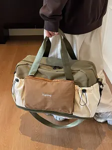 Retro functional style practical color blocked handbag, multi pocket design, with drawstring decoration, personalized texture, casual style, large capacity single shoulder crossbody bag, Handheld Bag, suitable for outdoor travel and short distance travel