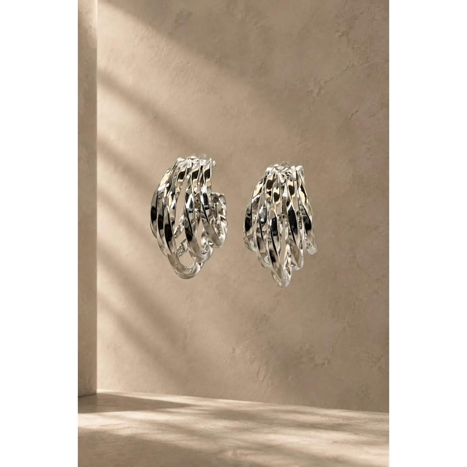 Elegant Silver Tone Interlocking Earrings for Women - Modern Design with Unique Textured Pattern