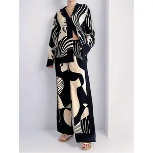 Women’s geometric print button-front shirt and pants two-piece set, elegant long-sleeve V-neck top and wide-leg pants for spring and autumn, women’s everyday wear GARMENTARY