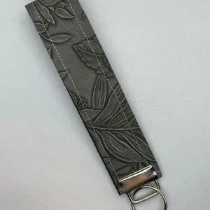 Leather floral wristlet