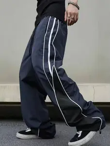 Unisex striped print athletic pants with side zipper at the waist; comfortable casual everyday pants; breathable all-season athletic pants; casual sports pants; outdoor training pants