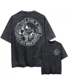 Unisex Oversized Black T-Shirt with a Vintage Wash, Featuring Short Sleeves And a Graphic Design. Suitable for Both Men And Women, It Includes The Phrase 'Hang in There, It Gets Worse' Along with a Skeleton Graphic