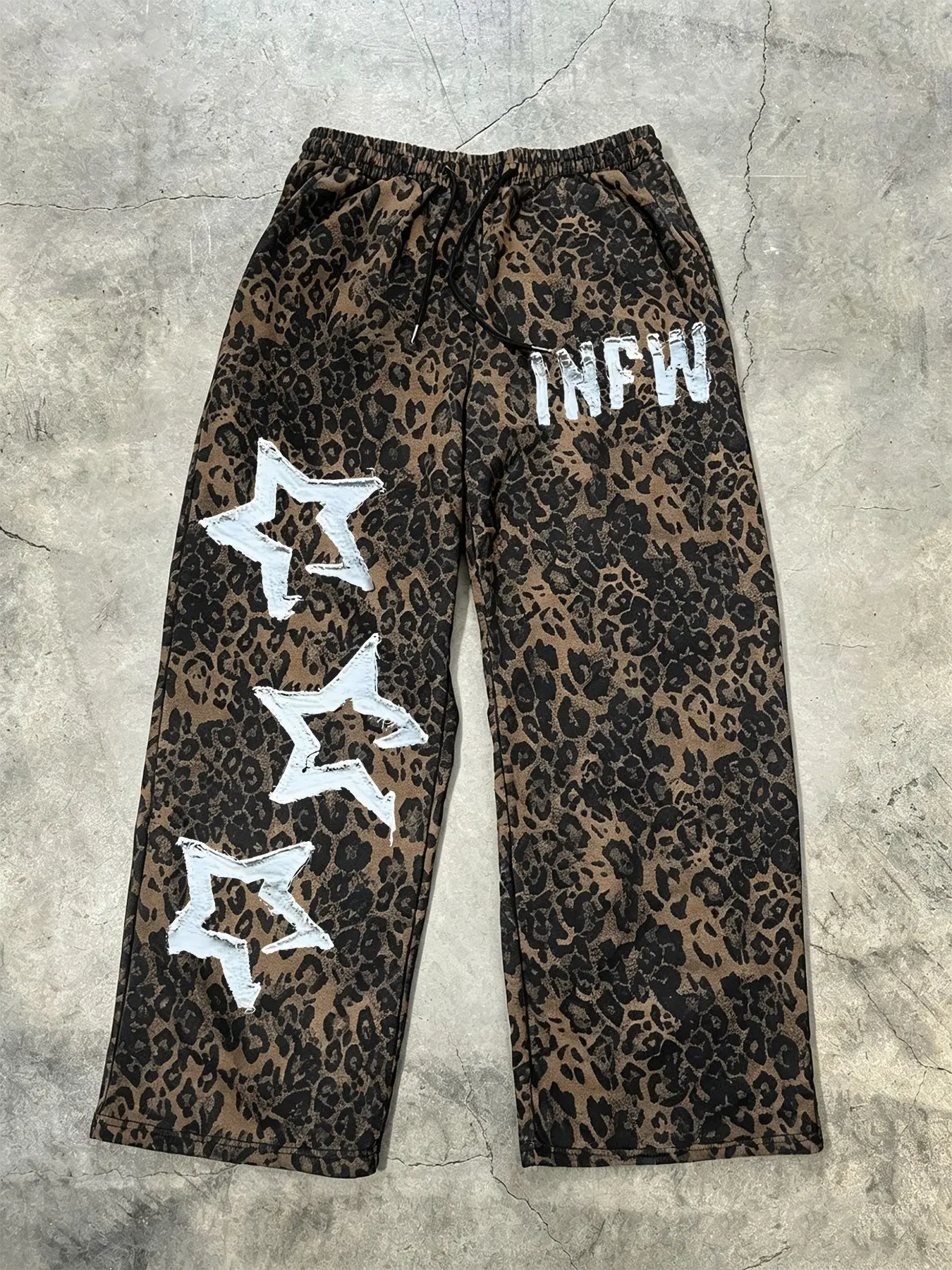 Unisex street style, Casual streetwear pants, Casual Street Comfy, leopard print pants with a relaxed fit, drawstring waistband, comfortable design. Perfect for daily wear, suitable for hip-hop, campus, commuting