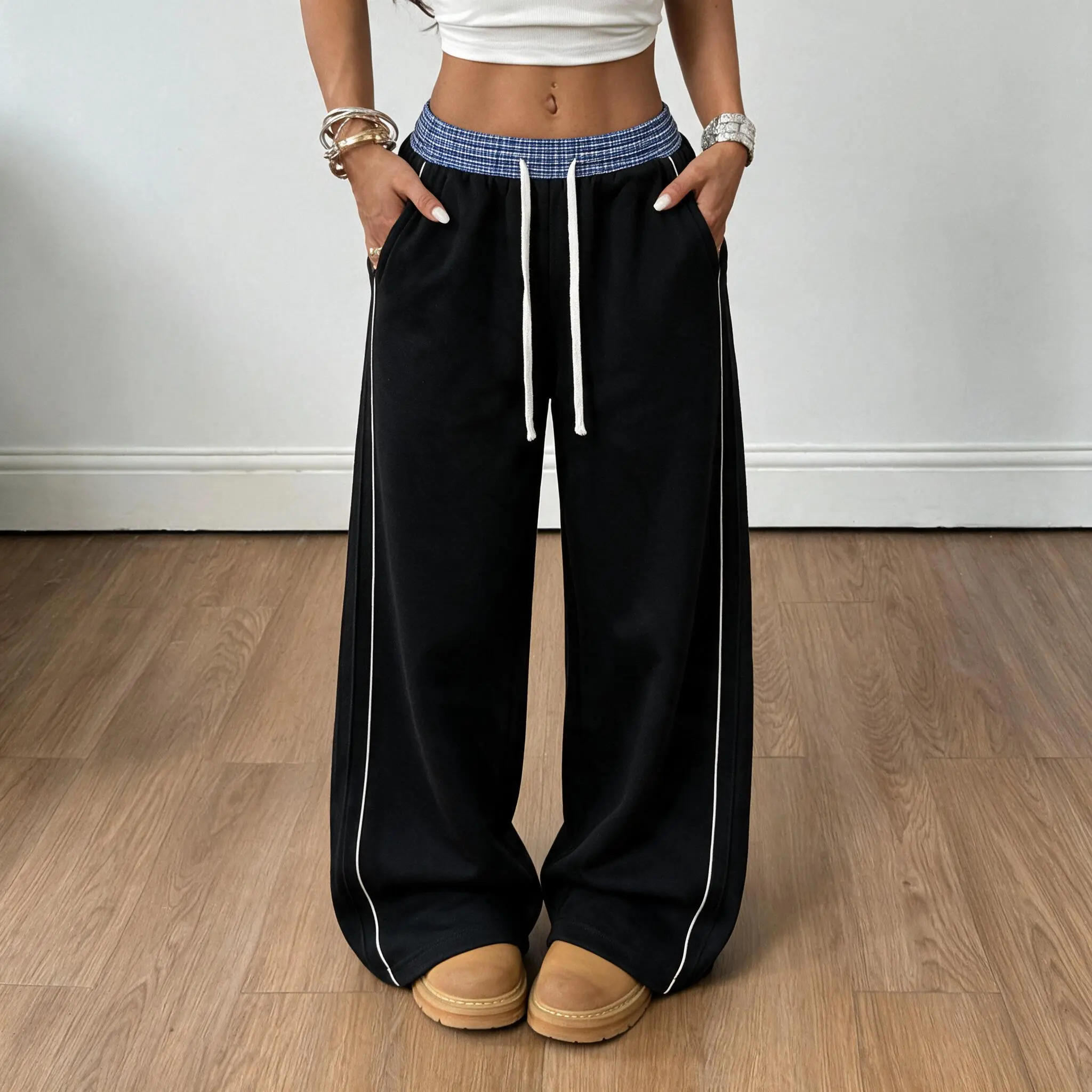 Women’s spring/autumn casual fashion long pants, versatile new design with plaid patchwork and side stripes, drawstring waist, straight cut, cotton blend fabric, suitable for outdoor sports, everyday wear, and street outings.