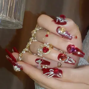 Vibrant Red Long Tapered Press On Nails, Wine Red Glitter with Large 3D Ruby Heart Gemstones, Silver Starburst and Bow Accents, Luxurious Chain De