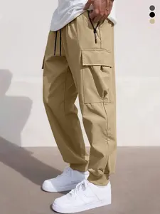 Men’s jogger pants with multiple pockets, zippered storage, 100% polyester; men’s athletic fitness long pants suitable for all seasons; casual, versatile summer long pants.