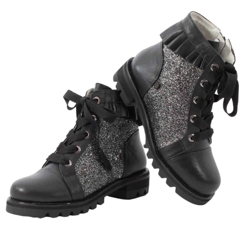 QUADSis Brooke Lug sole boot, with working laces and inside zipper and ruffle styled for girls in Women's Shoe Sizes boots