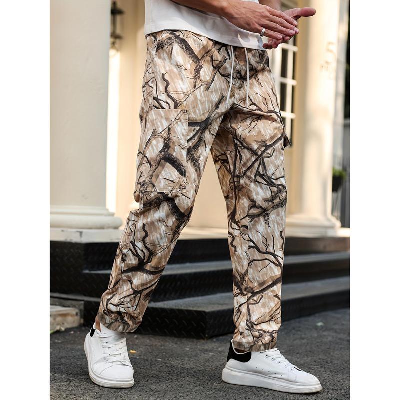 Men's camouflage print zippered pocket trousers, slim-fit athletic pants, durable trousers for autumn, men's wear-resistant outdoor training pants, streetwear fashion, vacation wear, men's clothing