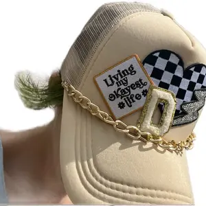Custom pressed “Initial” Trucker Hat with hat chain.