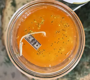 New Money Gold+Green Success Candle with Vibrant Orange Wax and Gold Accents for Wealth and Prosperity Symbolizes Luxury and Energy