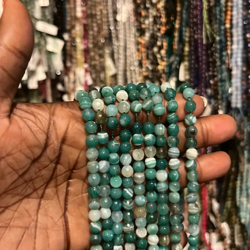 Faceted green white agate