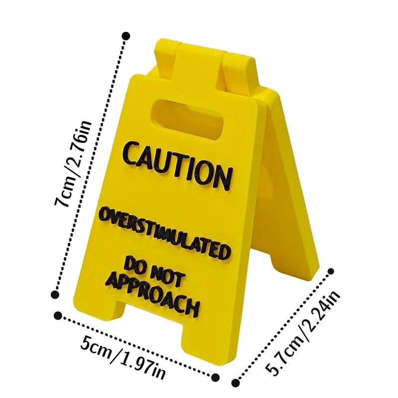 Caution Overstimulated Desk Sign - Yellow Sign with Black Text,  Humor Gag Gift for Coworkers, Boss & Employees, Mini Novelty Funny Desk Decor