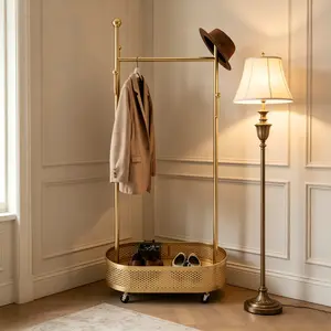 Luxury Gold Rolling Clothing Rack with Perforated Mesh Storage Basket, Modern Mobile Garment Stand with 360° Swivel Casters, Heavy Duty Metal Coat Hanger Organizer for Bedroom, Entryway, Boutique