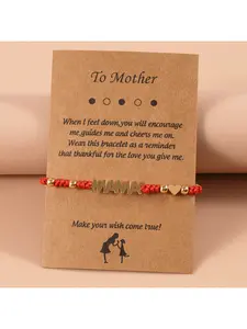 A handmade string bracelet with English letters for your mother. Comes with a card bearing a blessing.