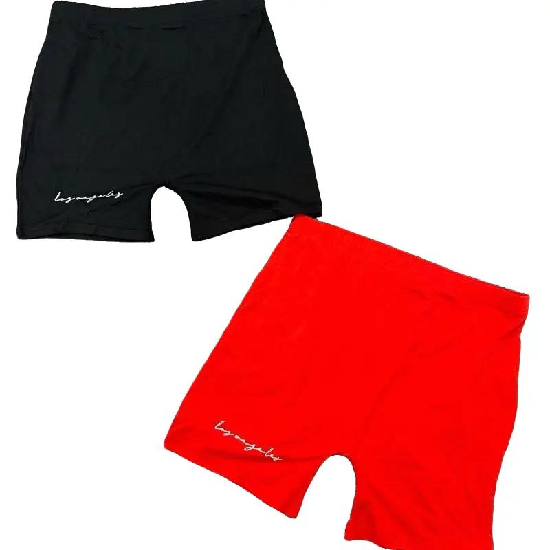 Shor Deportivo - Black and Red Shorts with "shor deportivo" Text on Fabric