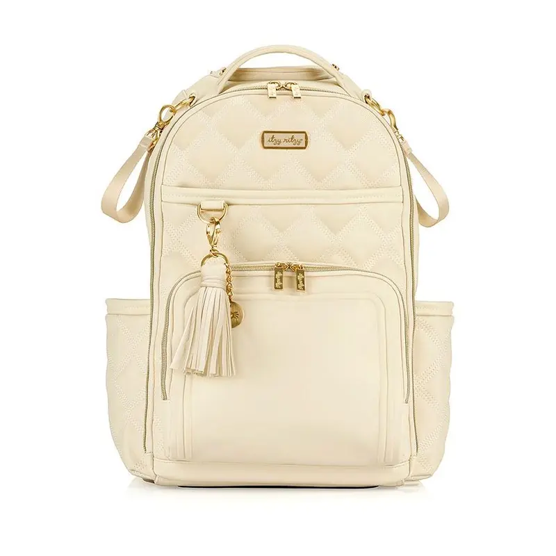 jansport backpack diaper bag Right Pack The soft yellow body is covered in embroidered flowers and tiny animals LifeInDressesAndSneakers: Our Minimalist Diaper Bag-