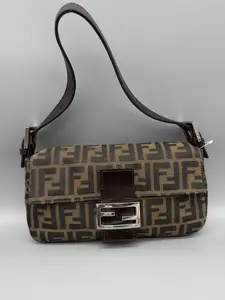 Pre-owned FENDI Canvas Shoulder Bags Zucca Baguette Shoulder Bag Brown Monogram Pattern with Adjustable Strap & Metal Hardware Compact Size 5.5x10.2x1.5 Inches
