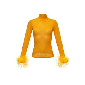 Yellow knit turtleneck with handmade knit details