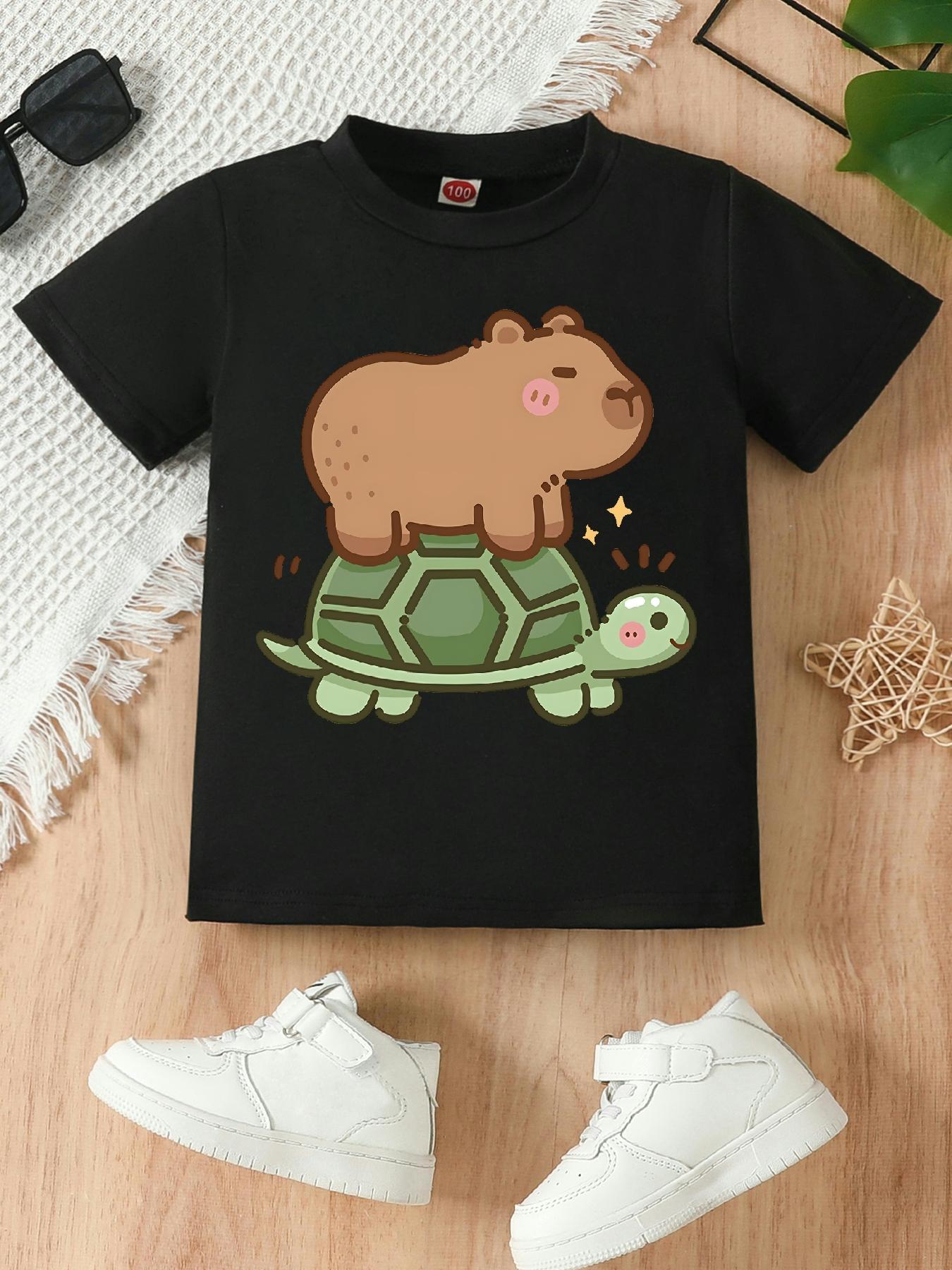 1Girls' T-shirt with Funny Cartoon of Kapi Riding a Turtle |   Casual Knit Top, Crew Neck, Regular Fit, Medium Stretch Fabric, Perfect Gift for Little Ones, All-Season Wear