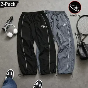 Two-pack gender-neutral Y2K bestsellers: parachute pants with trendy star print and color-block stripes; lightweight, quick-dry joggers with an elastic waistband and drawstring; casual street-style long pants; summer sports fitness pants with adjustable c