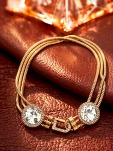 A retro yet elegant distressed gold snake bone necklace adorned with diamonds, featuring dual centerpiece stones and a D-shaped diamond clasp, suitable for various occasions such as evening parties, vintage outfits, and light business wear.