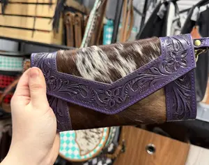 Genuine hand tooled leather & cowhide accordion style wallet- comes with wristlet strap and crossbody strap