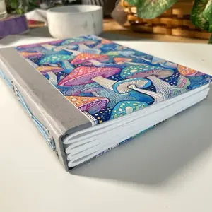 Kitty Karma Hand Stitched Journal Book with Colorful Floral Design, 5.5 x 8.5 Inches, Premium Acid-Free Paper, Durable Long-Stitch Binding, and Cute Calendar