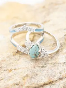 Featuring a stunning hollow design with turquoise and rhinestone accents, this ring makes a meaningful engagement or anniversary gift for your partner