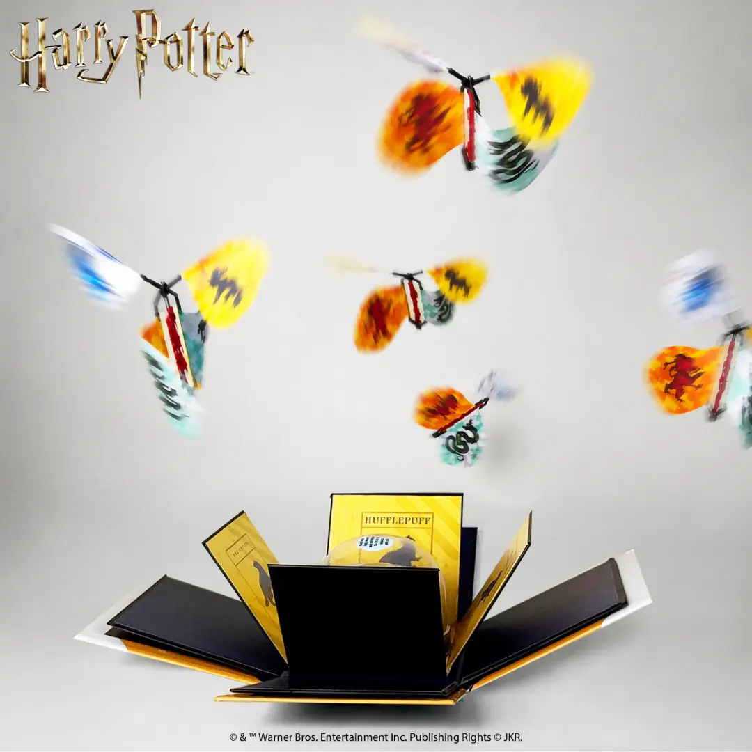 Harry Potter Hufflepuff Explosion Box Officially Licensed By Send A Cake - Create memories & celebrate birthdays, anniversaries, grads & more with this unique gifting experience! Including a flurry of house crest butterflies & cake, the perfect combo!