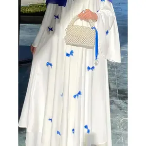 Elegant White Abaya with Blue Bow Accents - Modest, Spring/Fall Fashion, Long Sleeve, Perfect for Arabian & Middle Eastern Attire, Modest Clothing |     Elegant Abaya |     Detailed Fabric(Sheets)