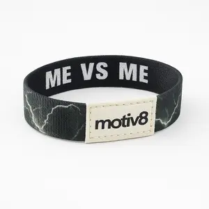 Motiv8 Me Vs Me Wristband - Black and White Design with Motiv8 Branding