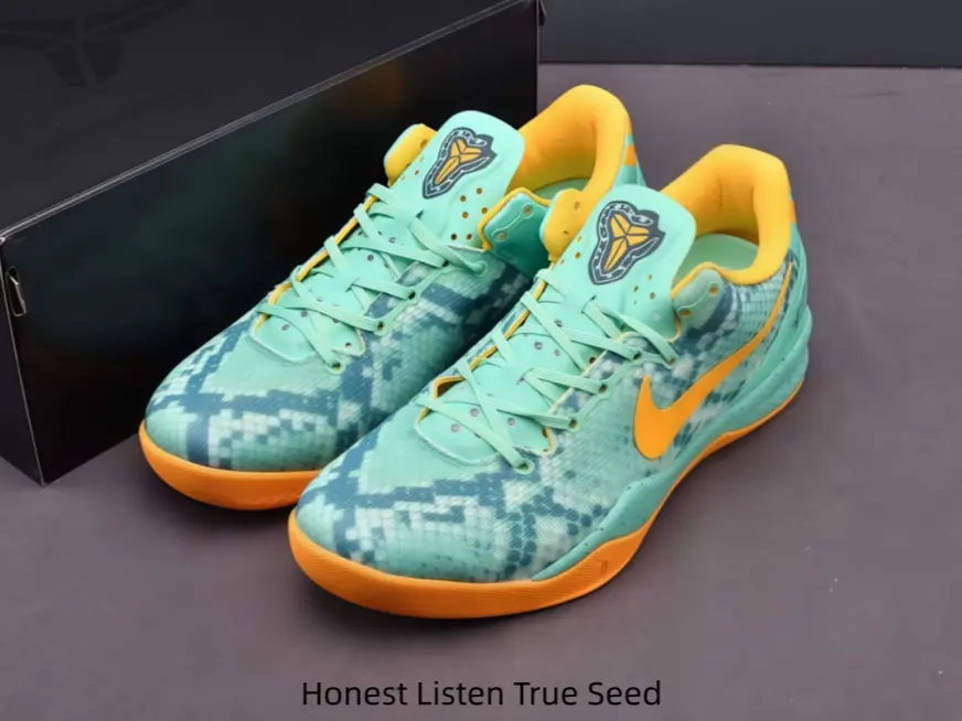 Mint Teal Pixel Print Low Top Basketball Sneakers Orange Side Graphic Bright Orange Inner Lining Full Orange Sport Sole