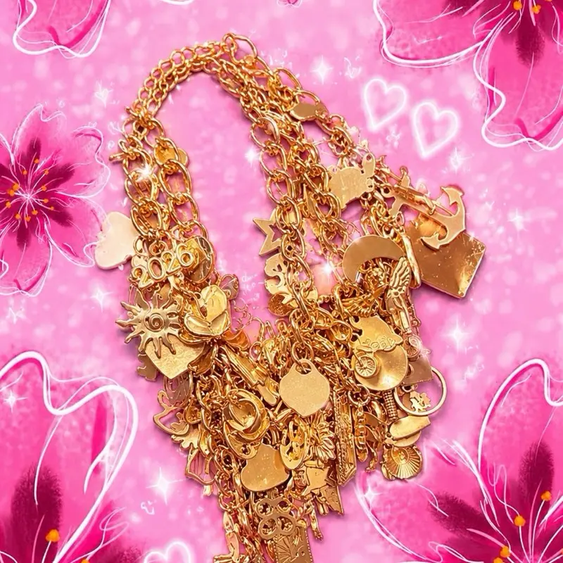 Junky Freestyle Charm Bracelet with Assorted Charms and gold Tone Chain for Fashion Accessories