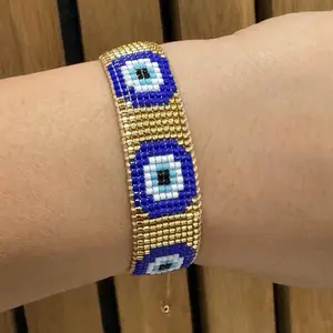 Adjustable Gold Miyuki Beaded Evil Eye Bracelet with Blue and White Beads for Stylish Accessory