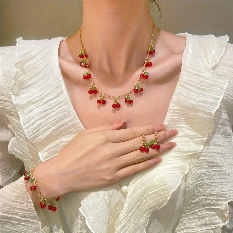 A set of 3 pieces, including cherry pendant necklaces, bracelets, and earrings, perfect for sweet girls, suitable for daily wear and gift giving.
