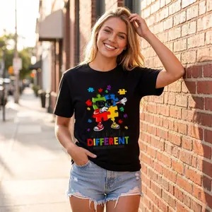 It's Ok To Be Different Autism Dude Tee  Puzzle Piece Character In April We Wear Blue Neurodiversity Acceptance Cool Kids T-Shirt