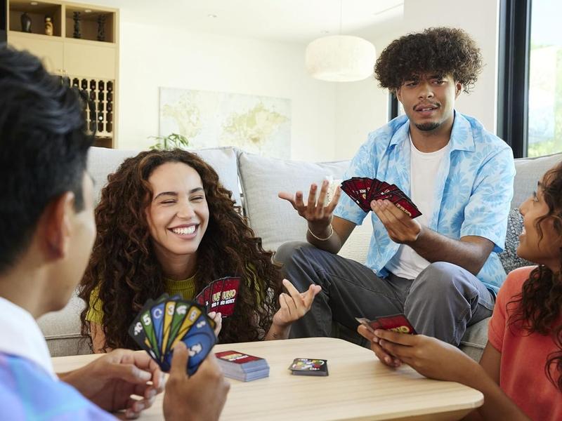 Mattel Games UNO Show 'em No Mercy Card Game for Kids Adults & Family Parties Travel with Extra Cards Special Rules & Tougher Penalties