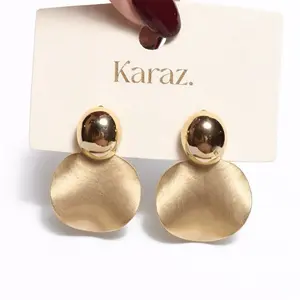 Karaz Golden Disc Statement Earrings