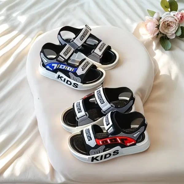 Stylish children’s sandals with a soft, non-slip sole, hook-and-loop closure, and fashionable letter design suitable for kids and students. Toddler Flip Flops