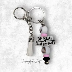 Charmingly Resilient Be Real Not Perfect Keychain with Beaded Charm and Tassel for Inspirational Accessory